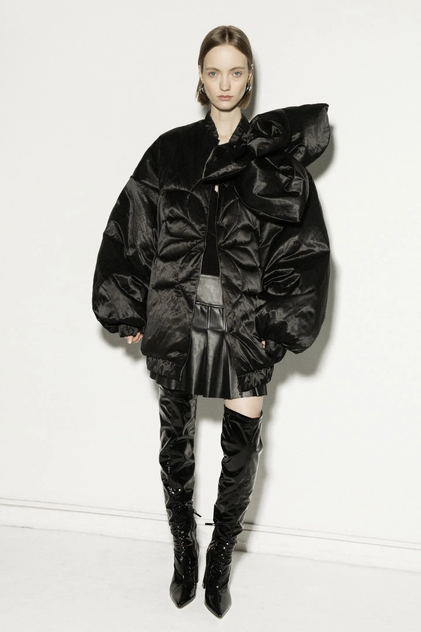 Long insulated bomber jacket with a 3d flower decor